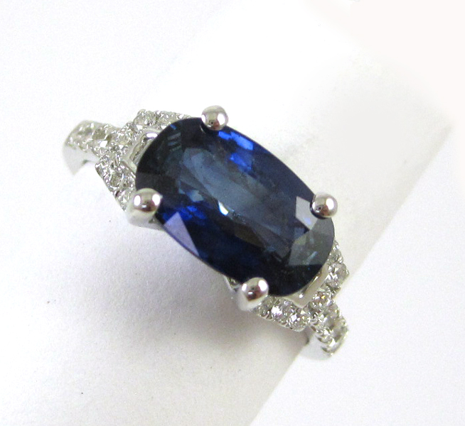 Appraisal: SAPPHIRE DIAMOND AND FOURTEEN KARAT GOLD RING The white gold