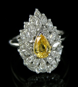 Appraisal: A Lady's Yellow Sapphire and Diamond Cluster Ring A pear-shape