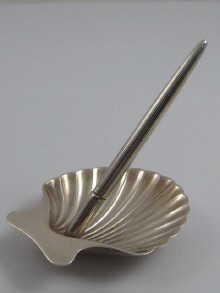 Appraisal: A silver pen holder in the form of a shell