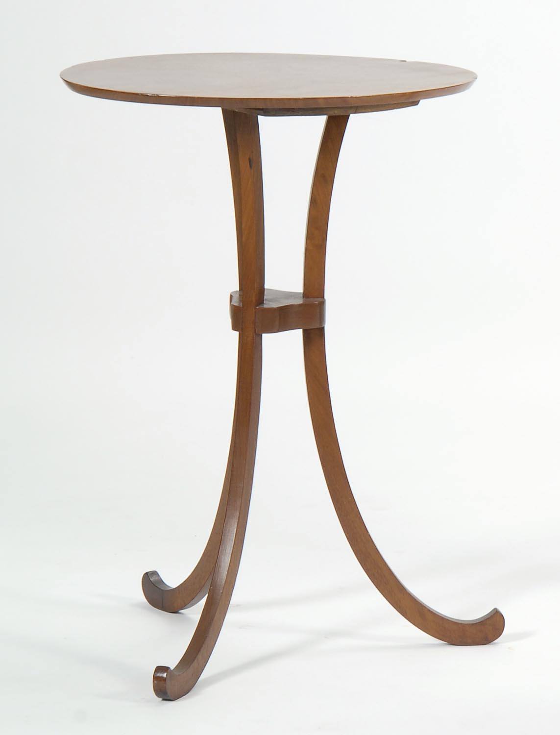 Appraisal: THREE-LEGGED CHERRY STAND with oval top and scrolled-out legs Height