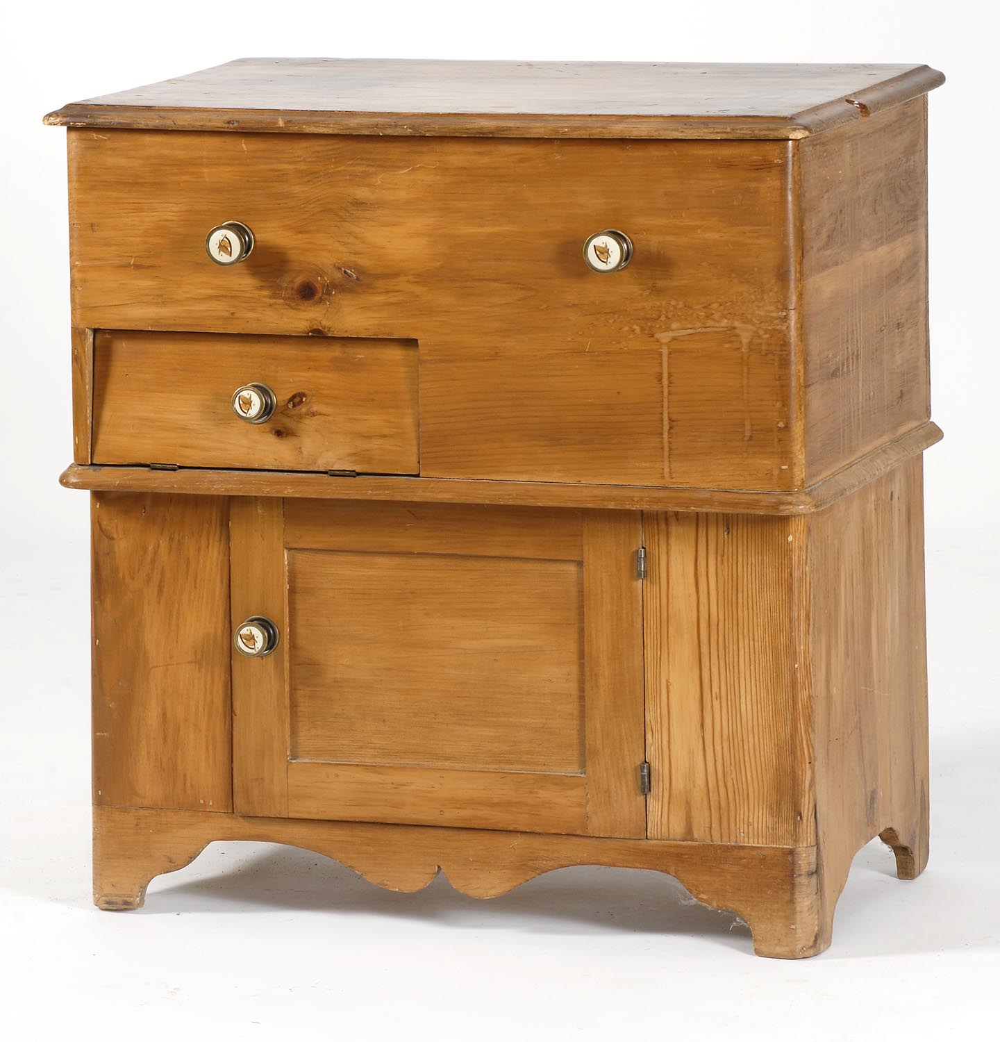 Appraisal: TH CENTURY LIFT-TOP COMMODE in pine Compartmented interior with single