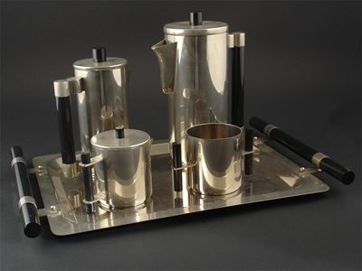 Appraisal: A stylish four piece metal coffee set with black plastic