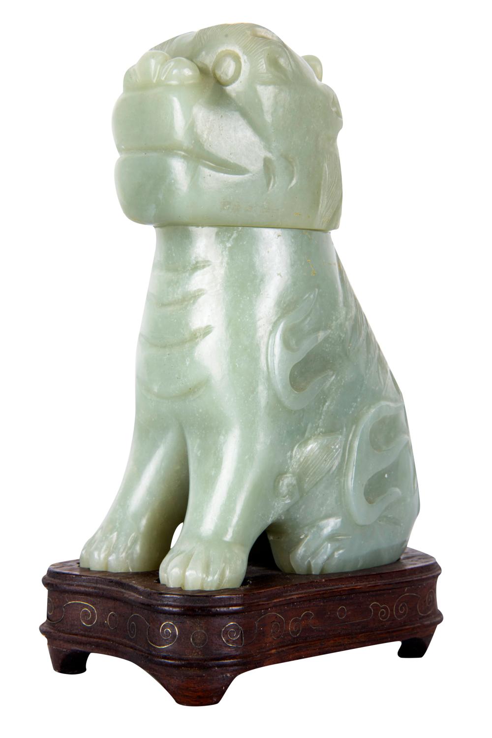 Appraisal: CHINESE CARVED STONE COVERED JARmodeled as a foo dog foo