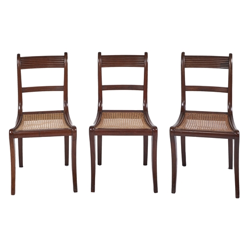 Appraisal: A set of three George IV mahogany dining chairs on