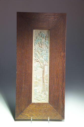 Appraisal: CLAYCRAFT Tall and narrow panel modeled with a eucalyptus tree