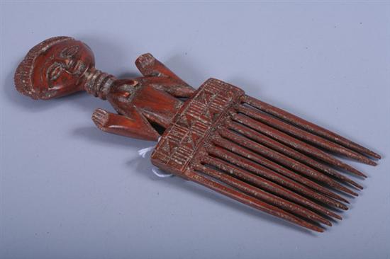 Appraisal: AFRICAN WOOD FIGURAL COMB - in high in wide