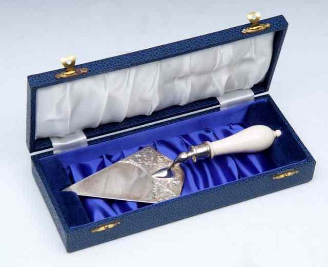 Appraisal: A SILVER AND IVORY PRESENTATION TROWEL the blade engraved with