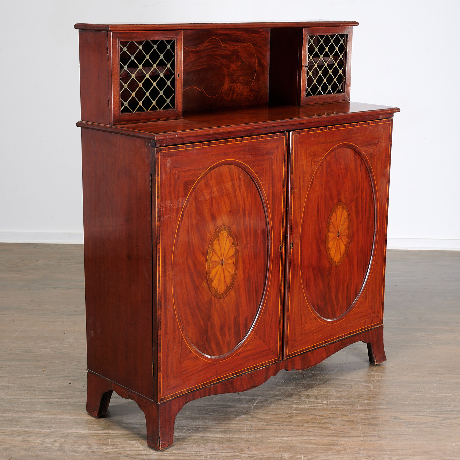 Appraisal: REGENCY PARQUETRY INLAID MAHOGANY CHIFFONIER th c two brass grilled