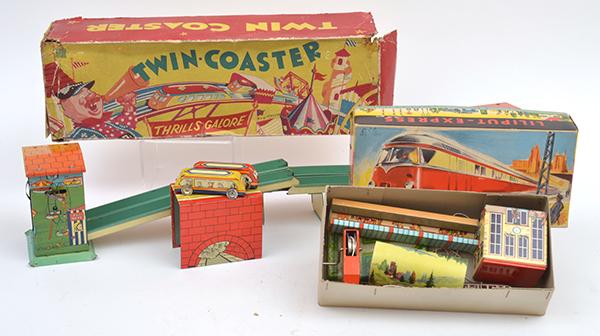 Appraisal: X CLOCKWORK TINPLATE MODELS INCLUDING TWIN COASTER AND LILIPUT-EXPRESS NR