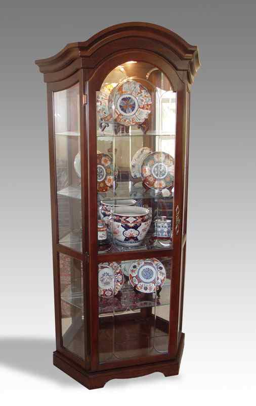 Appraisal: CONTEMPORARY ARCHED TOP CURIO DISPLAY CABINET Made in USA Illuminated