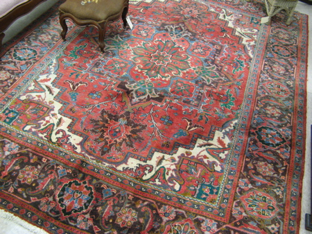 Appraisal: PERSIAN HERIZ CARPET Azerbaijan region northwest Iran floral and central