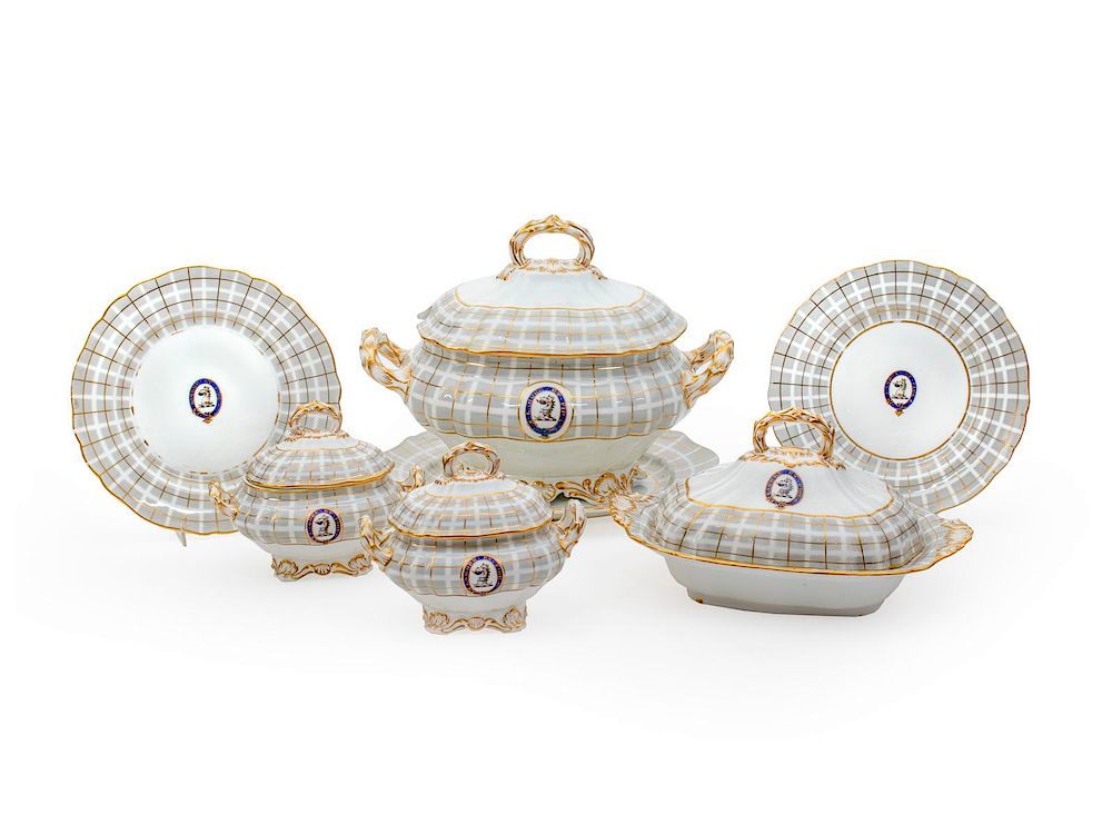 Appraisal: An English Porcelain Armorial Partial Dinner Service Length of platter