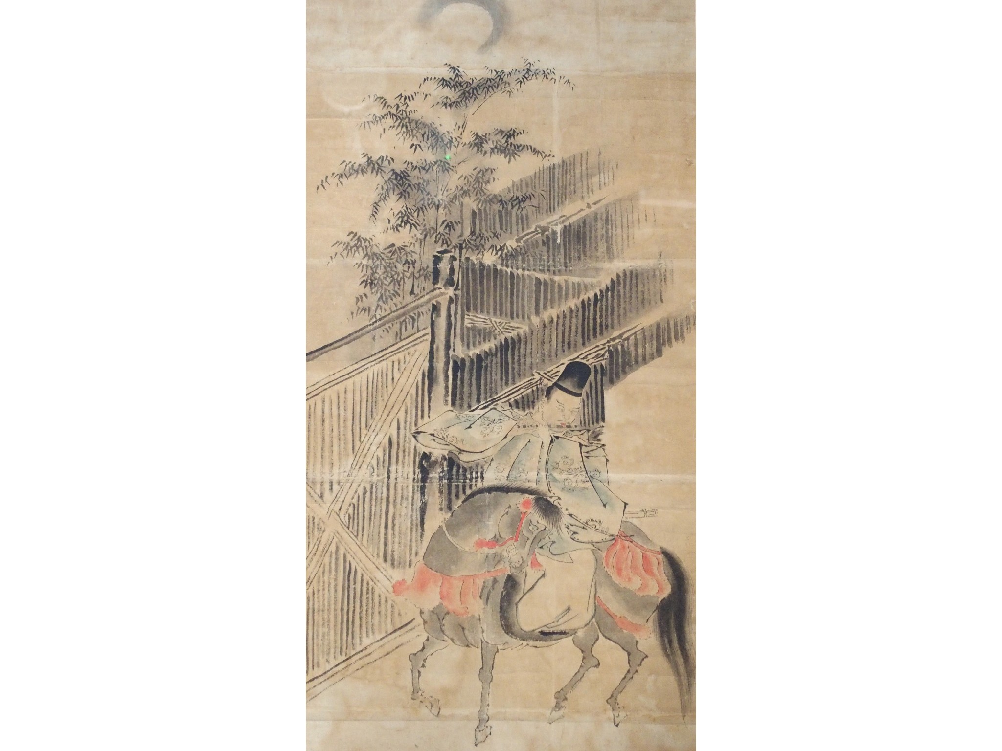 Appraisal: A Taira No-Jukimon figure on horsebackplaying a flute before bamboo