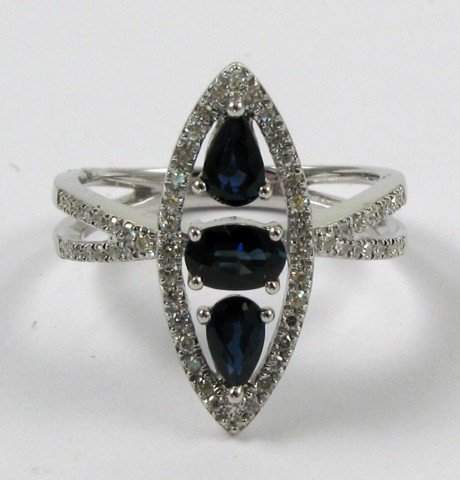 Appraisal: SAPPHIRE DIAMOND AND FOURTEEN KARAT GOLD RING set with two