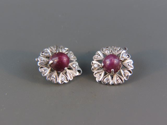 Appraisal: Ruby Diamond Earrings each with a cabochon cut star ruby