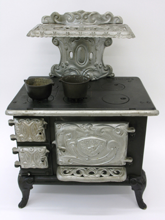 Appraisal: SALEMAN'S SAMPLE WOOD-BURNING CAST IRON COOK STOVE Buck's Stoves Ranges