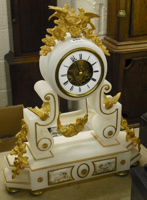 Appraisal: French alabaster and ormolu mounted two train mantel clock the