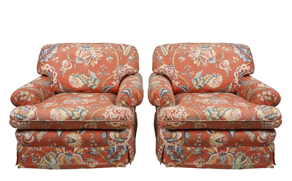 Appraisal: PAIR OF UPHOLSTERED CLUB CHAIRSmanufacturer unknown covered with red-ground printed