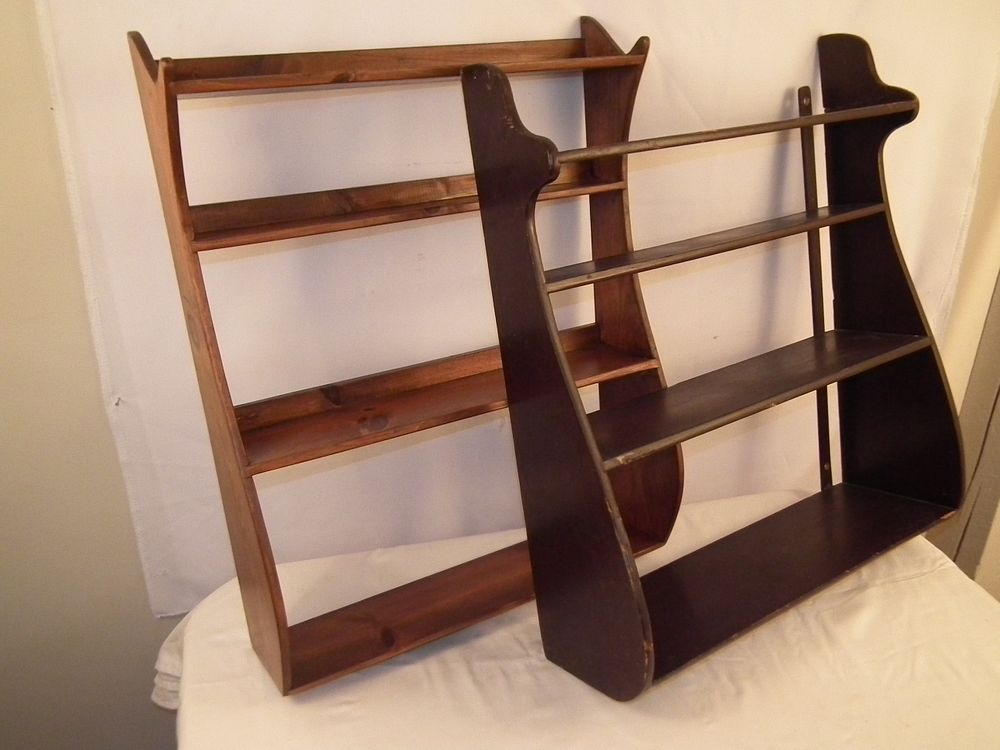 Appraisal: WHALE TAIL SHELVES vintage wood wall shelves with whale tail