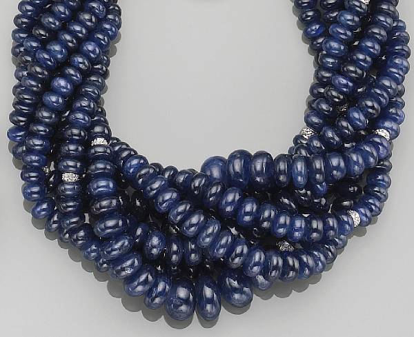 Appraisal: composed of graduated rondelle-shaped sapphire beads forming seven strands accented