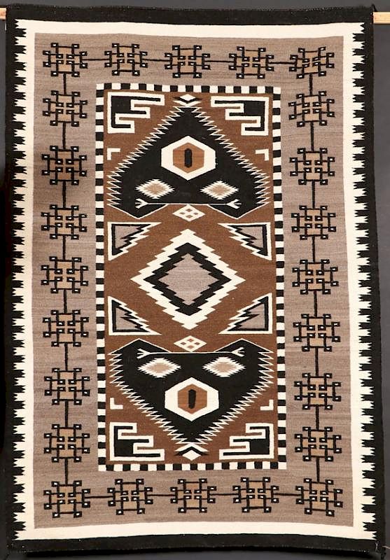 Appraisal: A LARGE SOUTHWEST NAVAJO TEEC NOS POS RUG A LARGE