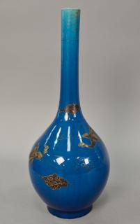 Appraisal: Oriental blue glazed phoenix bird vase having bottle form long