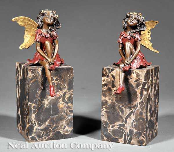 Appraisal: A Pair of Figural Bronze Bookends th c polychrome fairies