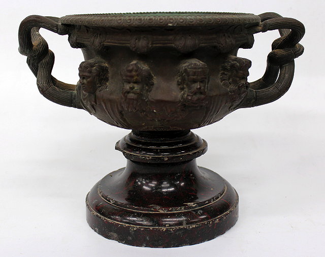 Appraisal: AN ANTIQUE BRONZE COPY OF THE WARWICK VASE with classical