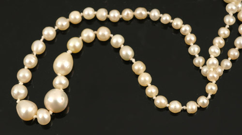 Appraisal: NATURAL PEARL NECKLACE WITH SILVER CLASP SET WITH DIAMONDS