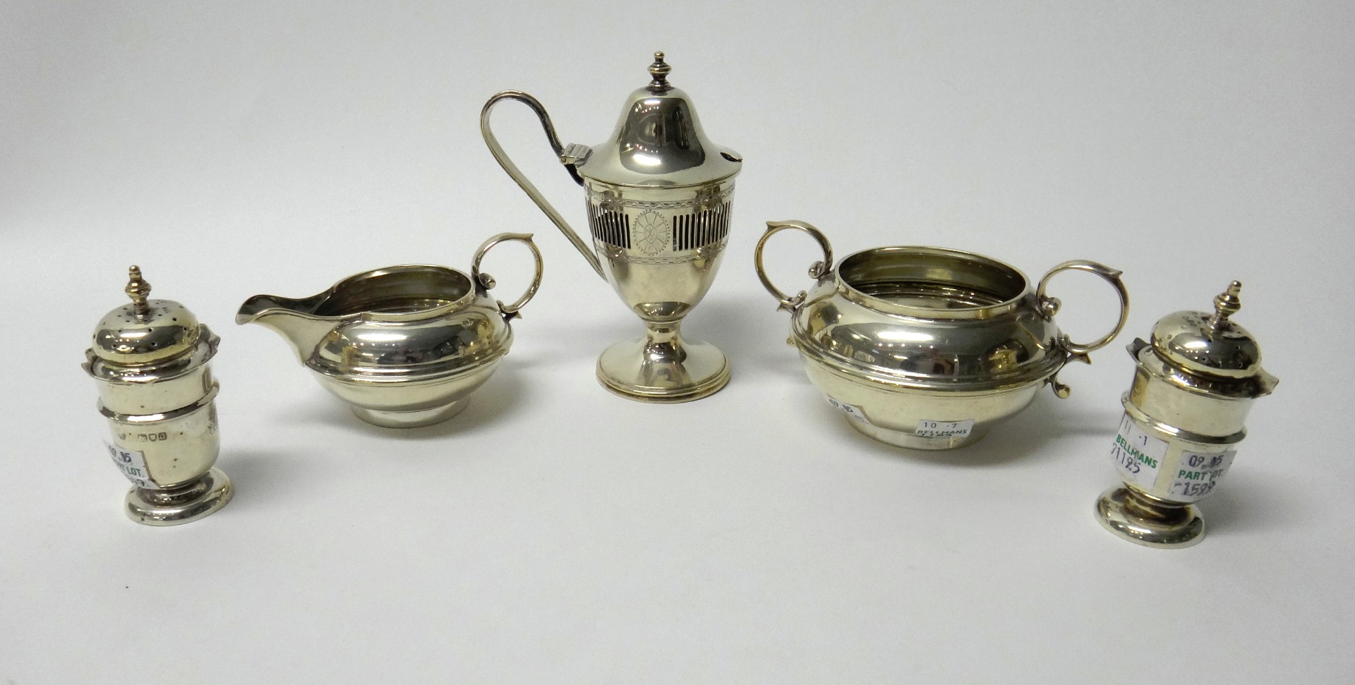 Appraisal: Silver comprising a twin handled sugar bowl of circular form