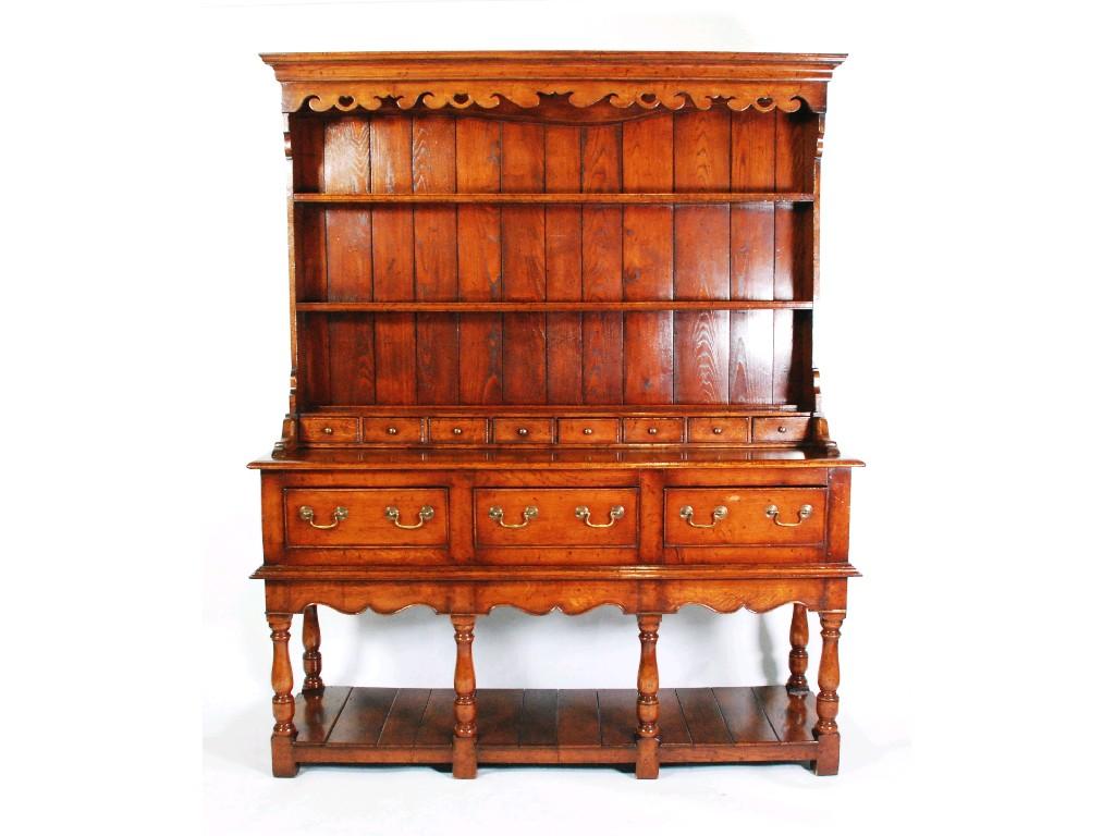 Appraisal: GOOD QUALITY MODERN REPRODUCTION OAK DRESSER the moulded cornice with