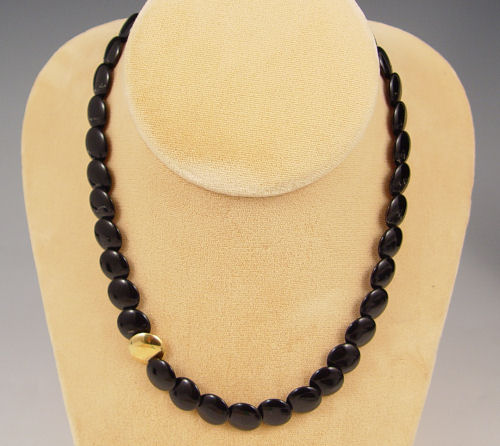 Appraisal: TIFFANY CO ONYX AND K GOLD DISK NECKLACE Strand of