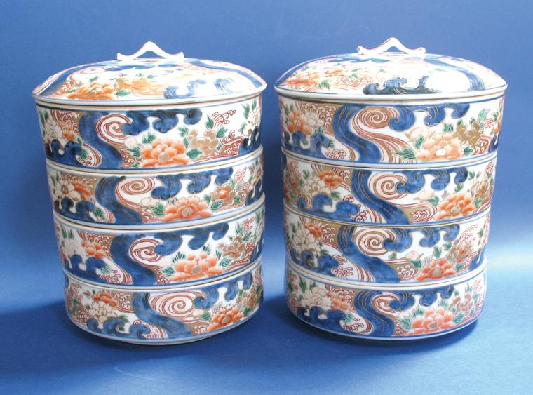 Appraisal: A PAIR OF IMARI CYLINDRICAL BOXES each containing four bowls