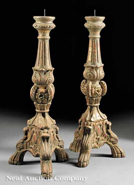 Appraisal: A Pair of Large Italian Carved Wood Prickets fluted and