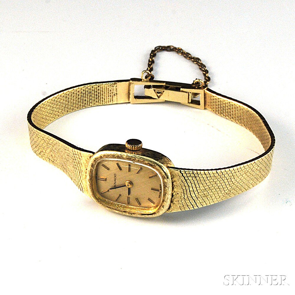 Appraisal: kt Gold Movado Bracelet Wristwatch with brushed gold-tone dial baton