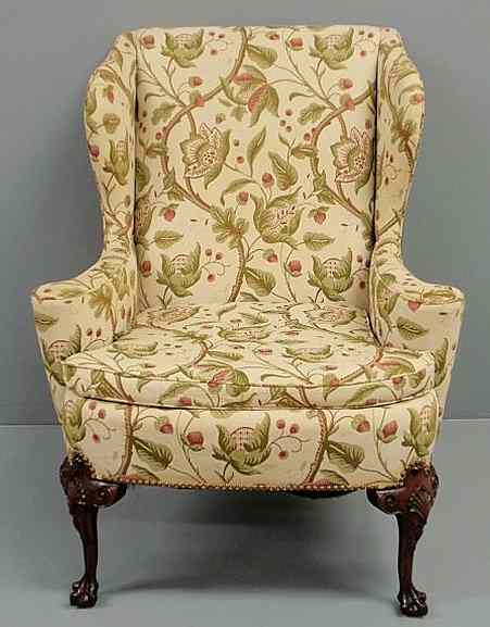 Appraisal: Kendal Chippendale style mahogany wing chair with carved ball claw