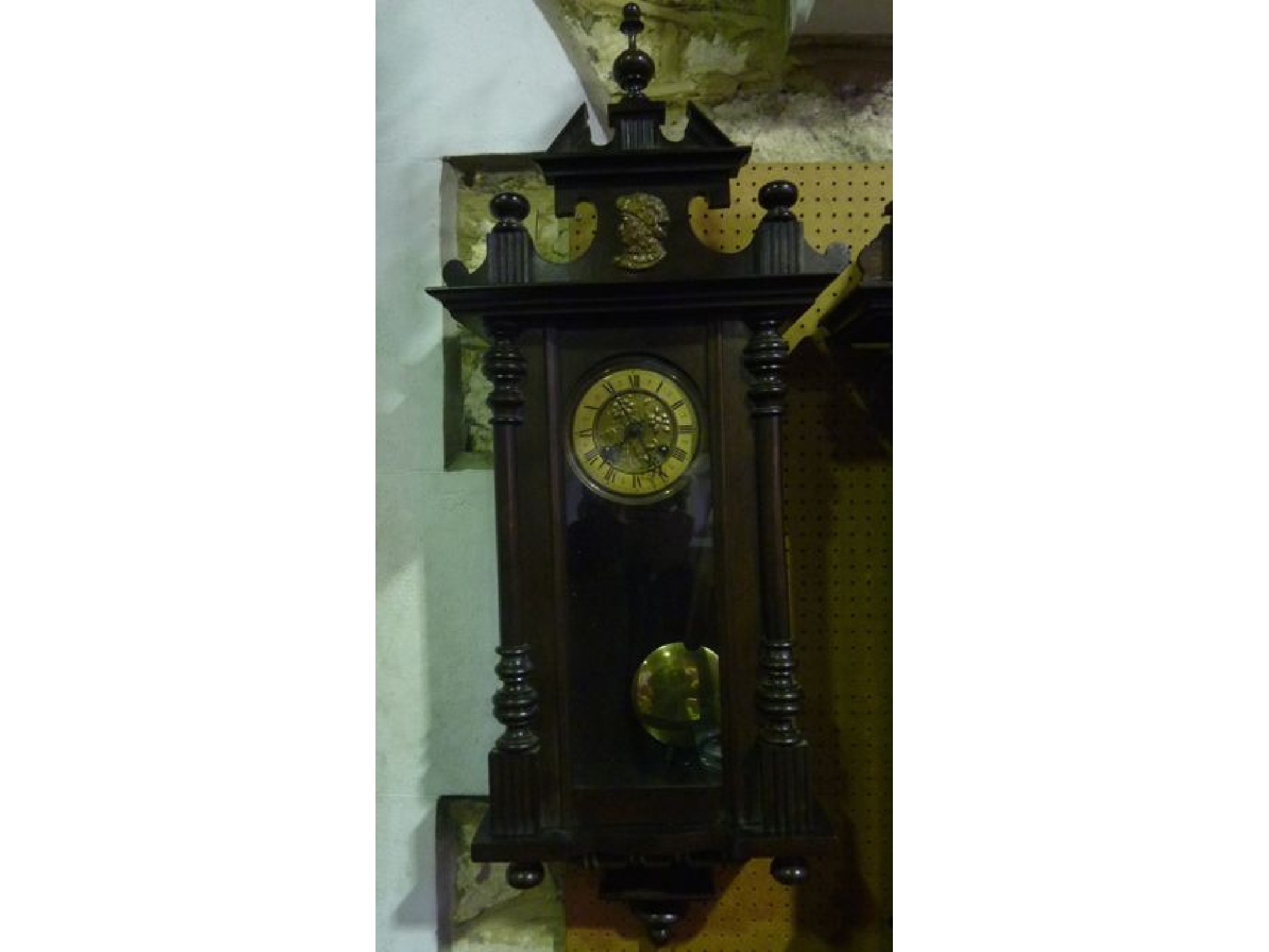 Appraisal: A late th century continental wall clock the walnut case