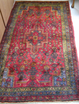 Appraisal: PERSIAN AREA RUG Western tribal Iran geometric medallion and stylized