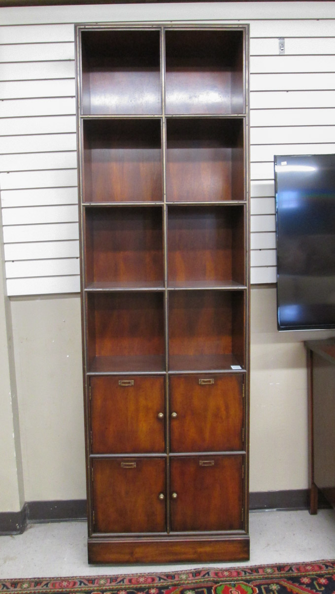 Appraisal: CAMPAIGN STYLE AGRA BOOKCASE Theodore Alexander Furniture Co model -