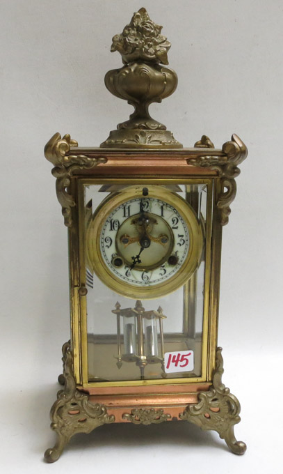 Appraisal: AN AMERICAN CRYSTAL REGULATOR MANTEL CLOCK Mogul model by Waterbury