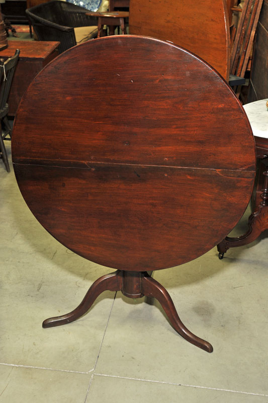 Appraisal: TILT TOP TEA TABLE Walnut with round top turned baluster