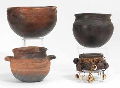 Appraisal: A Lot of African Decorated Pottery The three larger earthenware