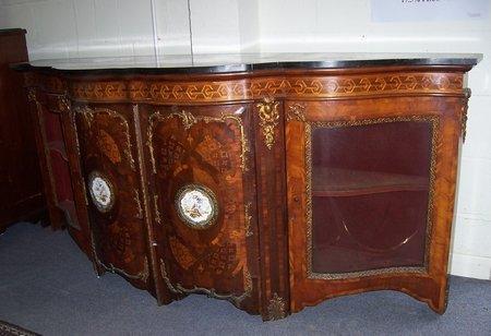 Appraisal: A late Victorian walnut and marquetry side cabinet of serpentine