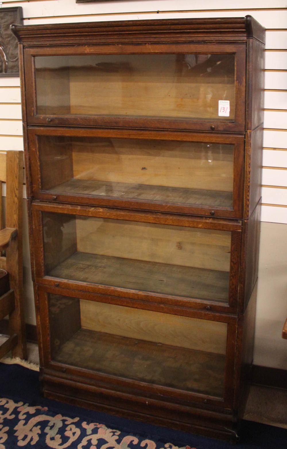 Appraisal: STACKING OAK BOOKCASE American early th century four horizontal stacking