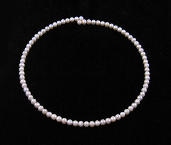 Appraisal: TWO CHOKER LENGTH PEARL NECKLACES including a inch choker with