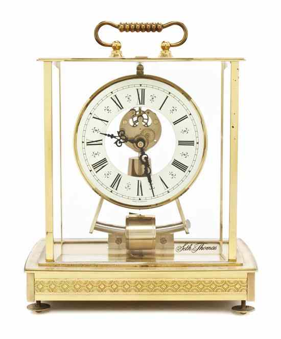 Appraisal: An American Brass and Glass Mantel Clock Seth Thomas having