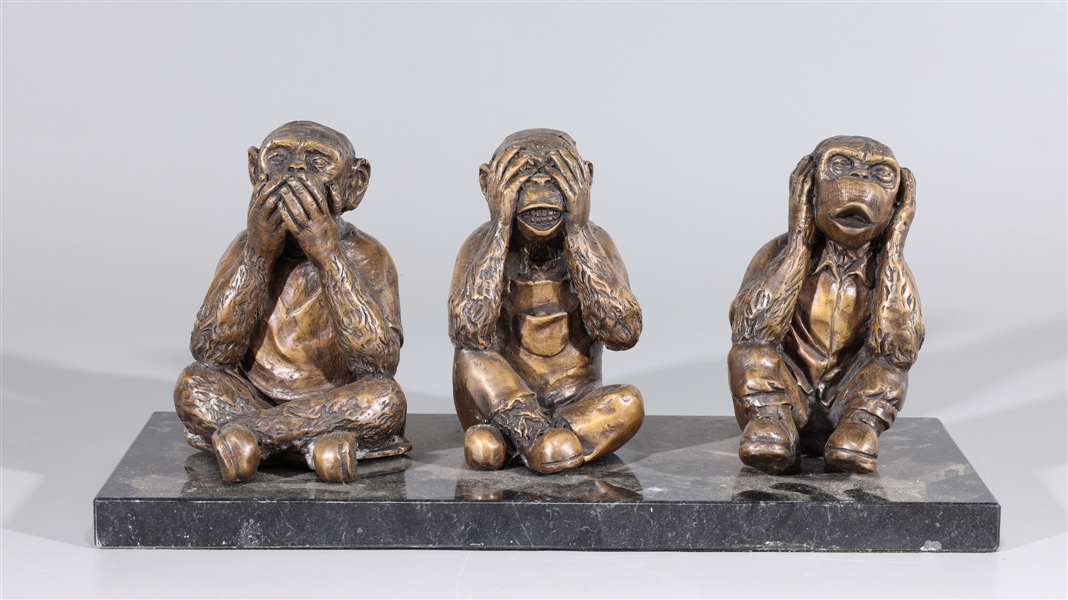 Appraisal: Three bronze monkey statues on marble base overall good condition