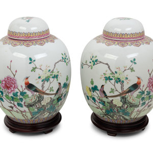 Appraisal: A Pair of Famille Rose Porcelain Jars th Century Height