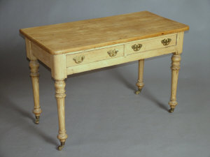 Appraisal: A Victorian pine desk the rectangular top with rounded corners