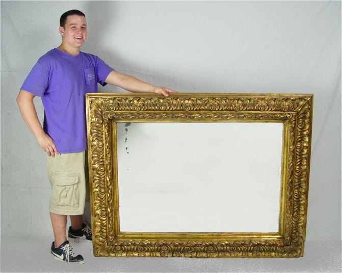 Appraisal: EARLY TH C GILT WOOD MIRROR Deep carved wood frame